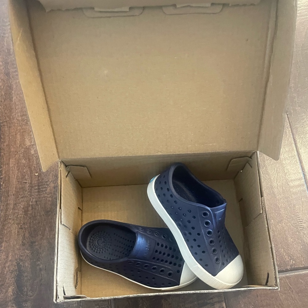 Navy and white native shoes size c6